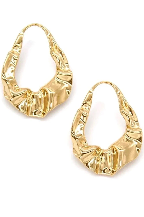 Boucles d’Oreilles Créoles Ondulées – Chic & Tendance