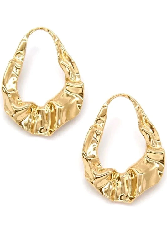 Boucles d’Oreilles Créoles Ondulées – Chic & Tendance