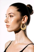 Boucles d’Oreilles Créoles Ondulées – Chic & Tendance