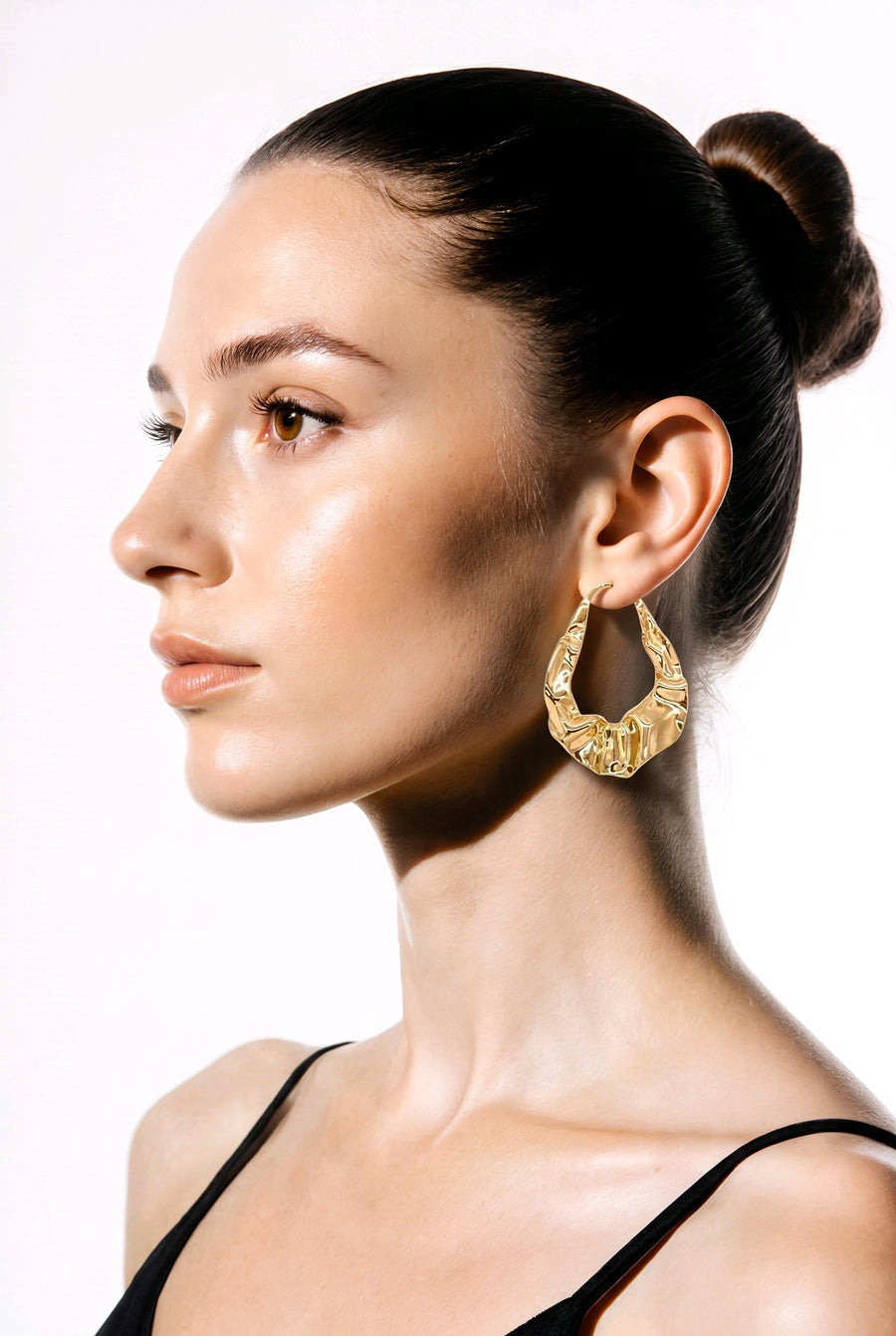 Boucles d’Oreilles Créoles Ondulées – Chic & Tendance